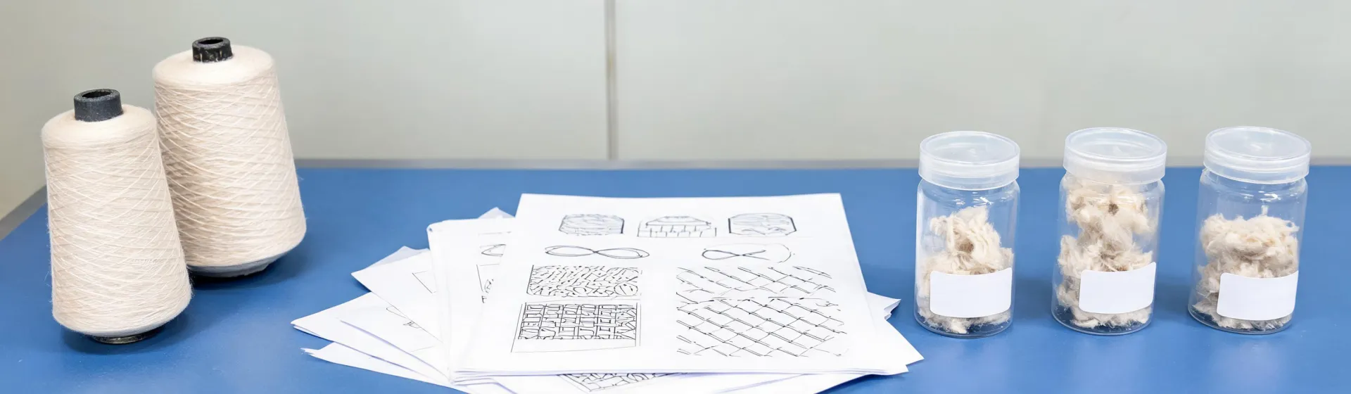 Fiber grade documents beside industrial yarn samples